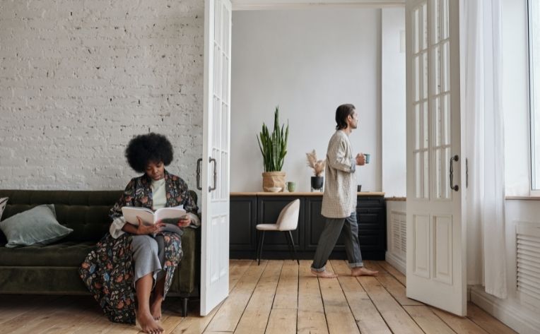 two people on bare feet floors